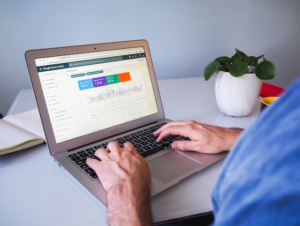 Man looks at Google Search Console on his laptop.