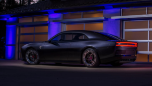 Black Dodge Charger SRT EV at night.