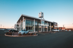 BMW dealership at sunrise.