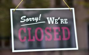 Sorry we're closed sign.