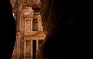 Archeology site seen through crevice in cave.